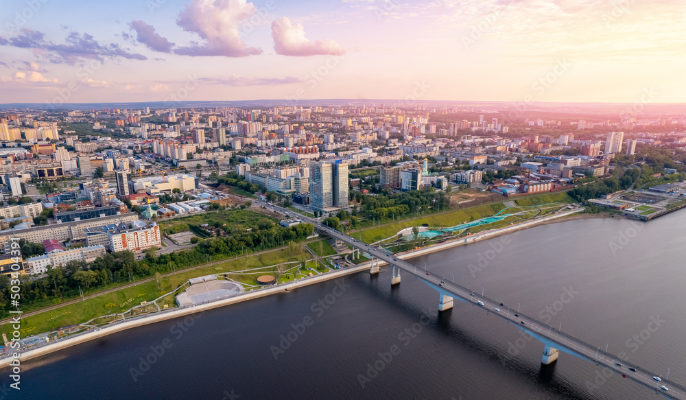 Aerial top view panorama city Perm and Kama river Russia, sunset drone photo
