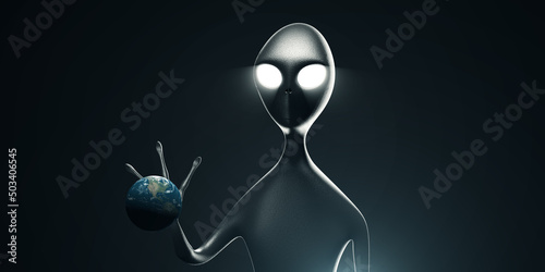 Alien holding Earth Planet in the Hand on Dark Backgroun