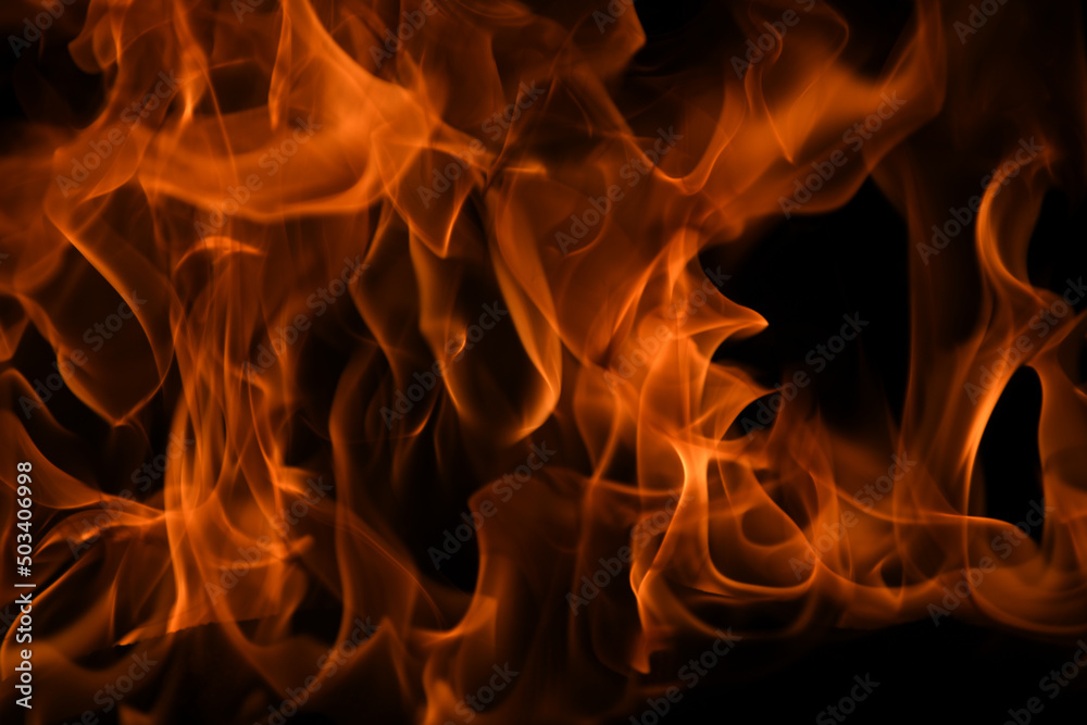 Fire blaze flames on black background. Fire burn flame isolated, abstract texture. Flaming explosion with burning effect. Fire wallpaper, abstract art pattern with copy space. Fire blaze flames on black background. Fire burn flame isolated, abstract texture. Flaming explosion with burning effect. Fire wallpaper, abstract art pattern with copy space.