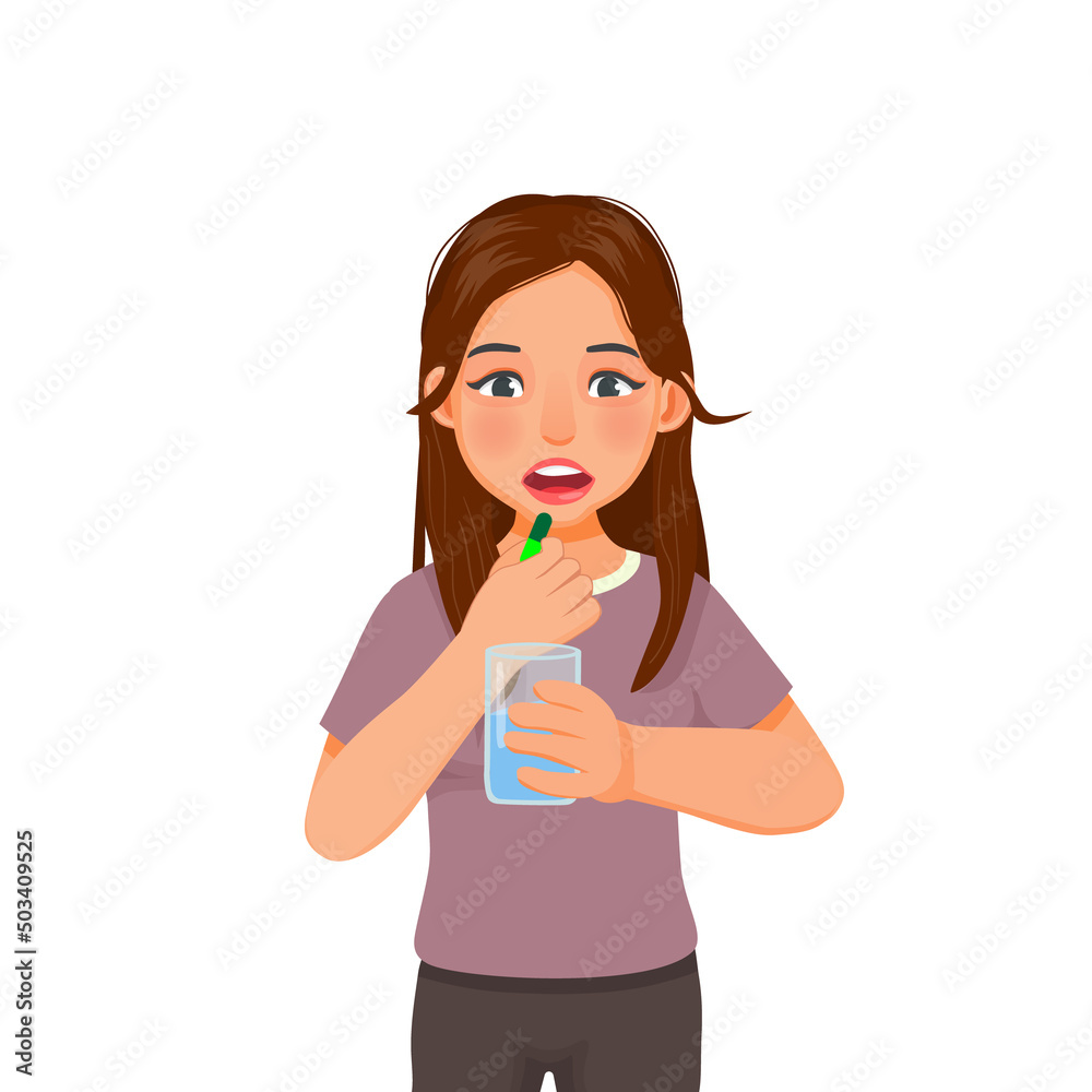 beautiful young woman feeling sick taking medicine capsule with a glass of water beautiful young woman feeling sick taking medicine capsule with a glass of water