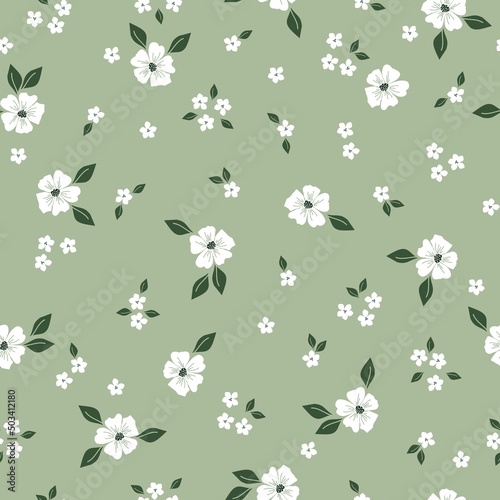 Seamless vintage pattern. White flowers, green leaves. Light green background. vector texture. fashionable print for textiles, wallpaper and packaging.
