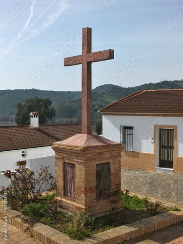 Large cross on a pedestal, square in Sanlucar de Guadiana, Huelva - Spain photo