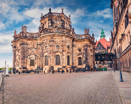 Gorgeous cityscape of Dresden with Katholische Hofkirche Cathedral. Summer morning scene of capital of Saxony, Germany, Europe. A street in the city center and the old buildings of Dresden.