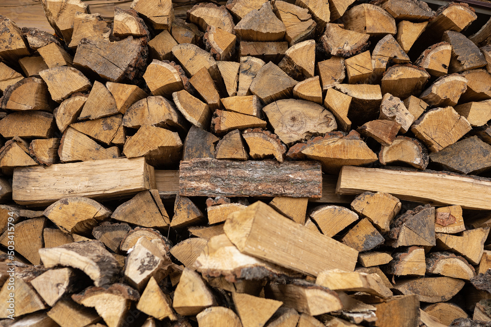 Stacks of Firewood. Preparation of firewood for the winter. Pile of Firewood.Firewood background. Stacks of Firewood. Preparation of firewood for the winter. Pile of Firewood.Firewood background.