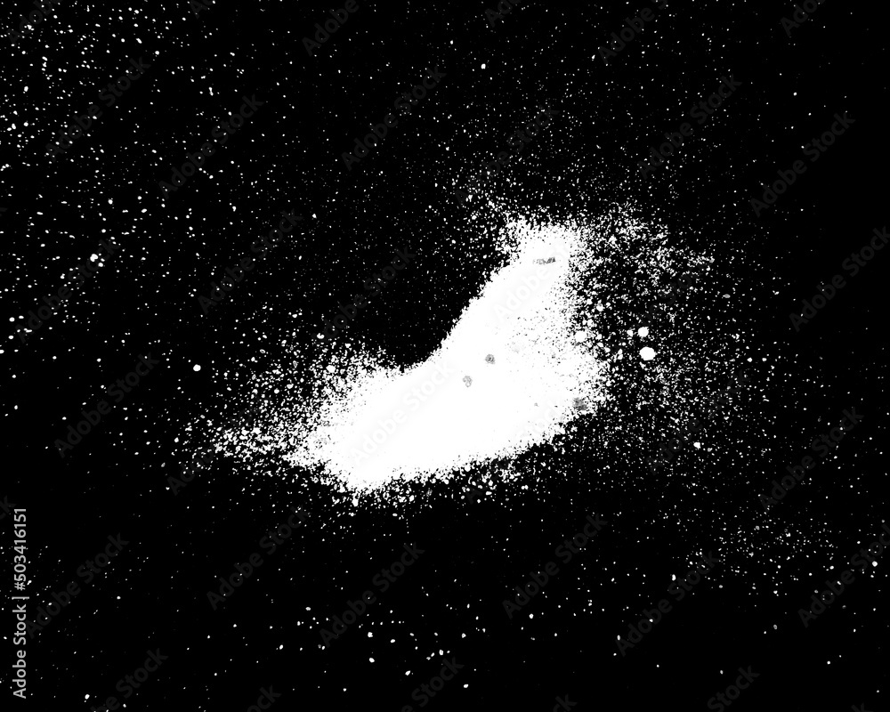 White powder explosion isolated on Dark background. White dust particles splash. Powder Explosion dust explodes Holy Festival.
