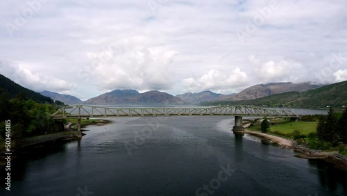 Ballachulish Bridge at Loch Linnhe near Fort William on a calm Spring morning calm sees reflections and clouds photo