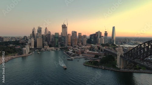 Wallpaper Mural Aerial drone pullback view of Circular Quay on Sydney Harbour revealing Sydney Harbour Bridge in the late afternoon      Torontodigital.ca