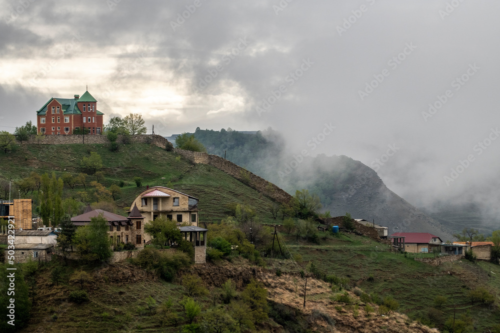 Fototapeta premium panoramic view of the mountains ancient settlements and gorges on a spring sunny day