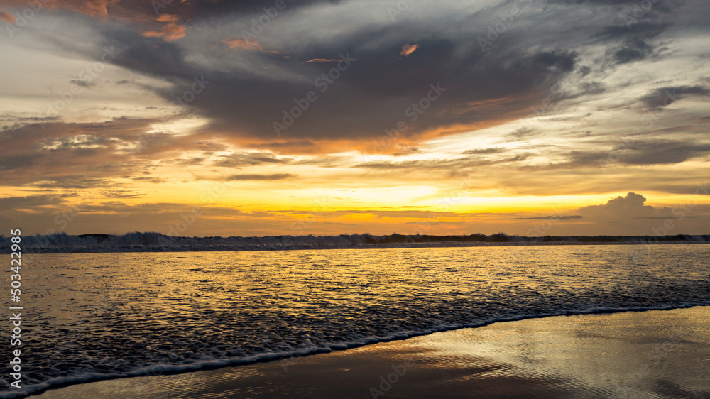 Amazing sunset at Legian beach in Bali, Indonesia