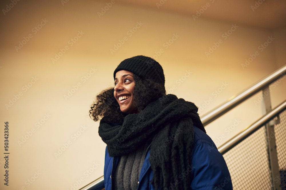 © Johnér - Smiling woman looking away