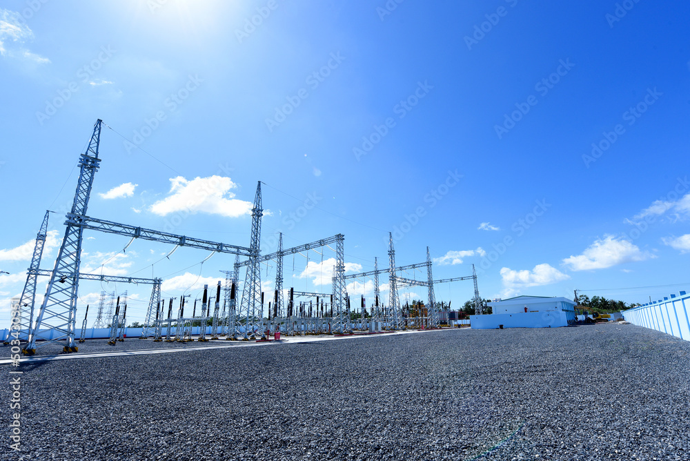 Electric Power Substation Under The Blue Sky:  Power Station, Electricity Substation, Power Line,Equipment, Cable. Industrialization Concept for Development