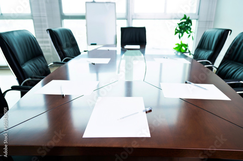 White paper with pen in the meeting room photo