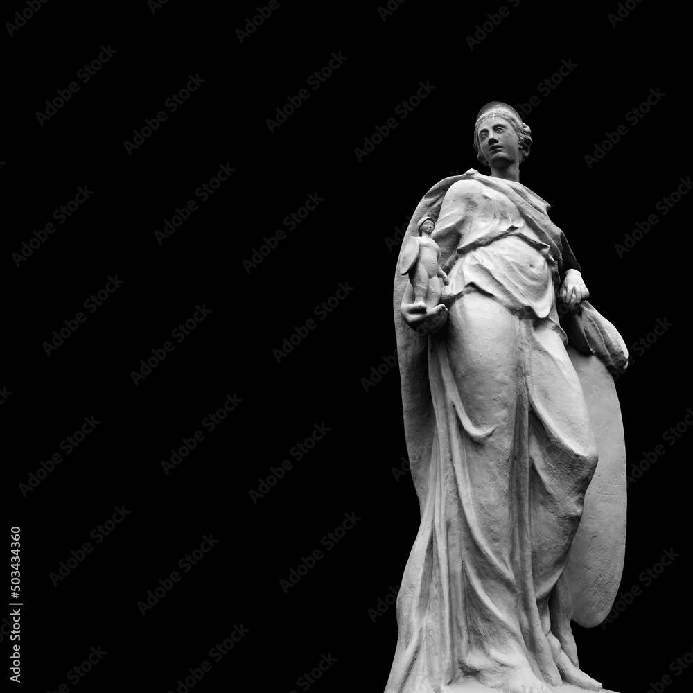 Goddess of wisdom and victory Athena isolated on black background. She holds the winner's warrior in her hand. Copy space for text or design.