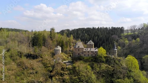 Castle of Reinhardstein on hill in the Belgian Ardennes - Warche valley, Belgium photo