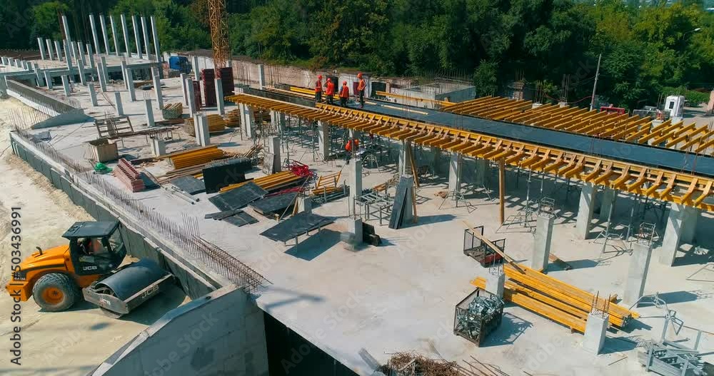 Construction process of a modern football stadium. Builders make