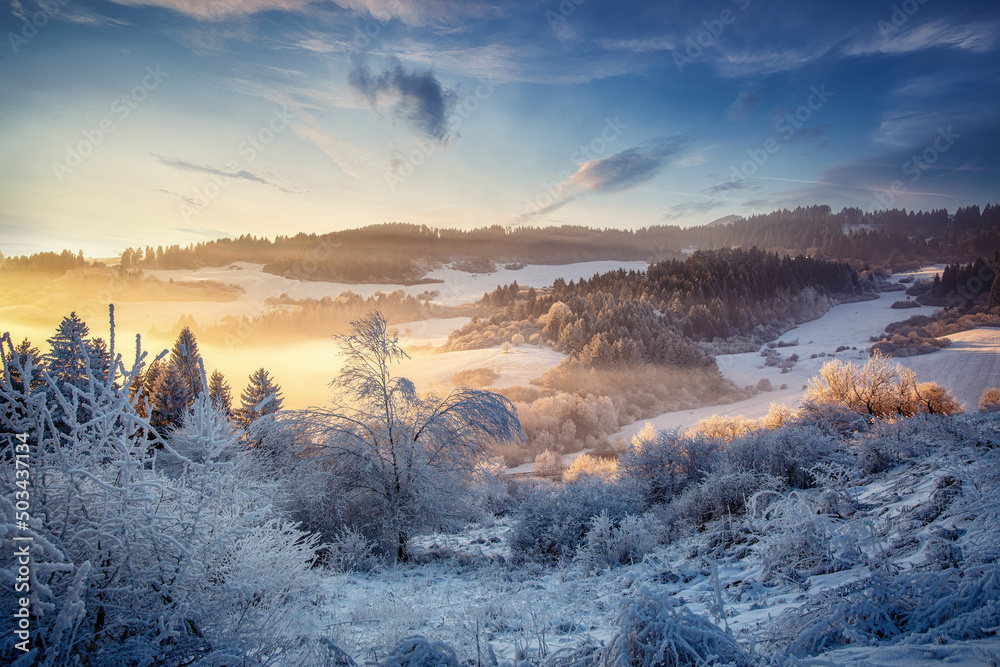 Beautiful mountain snowy landscape. Sunset landscape.