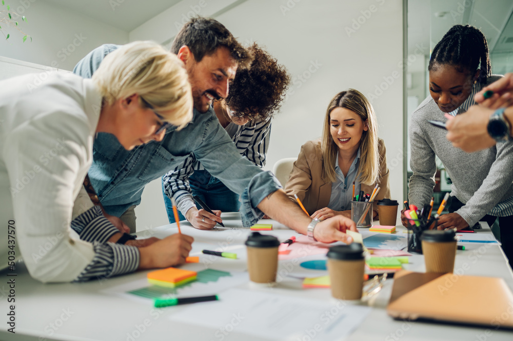 Fototapeta premium Multiracial business team on a meeting in a modern bright office
