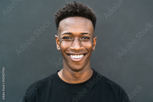 Happy young African teenager smiling in front of camera Fototapeta