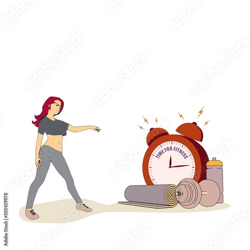 Sport young woman wearing casual workout clothes. Training and home exercising and fitness equipment. Dumbbell, yoga mat and bottle. Girl pointing at the alarm clock with time for fitness inscription