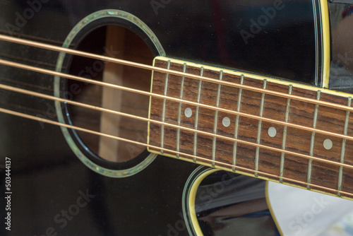 Acoustic bass guitar isolated on the white background