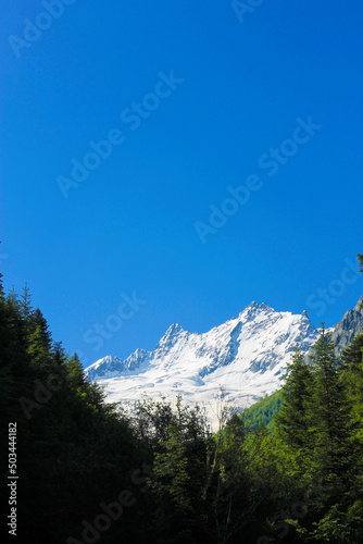 Caucasus Mountains Under Snow And Clear Blue Sky