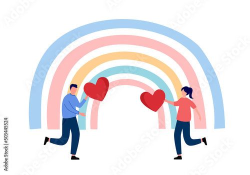 Man and woman holding red heart with rainbow on background. Cheerful couple dating. Kindness or generosity.