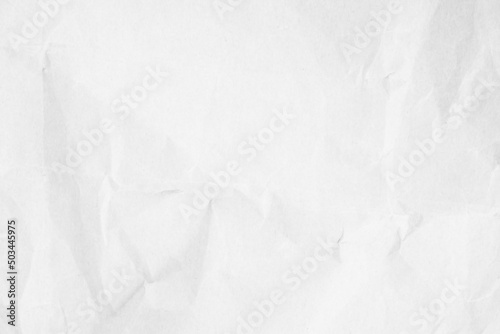 Crumpled white paper texture background for various purposes.