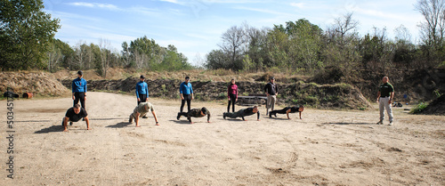 Fotografia, Obraz Large group of army soldiers have training and doing push-ups