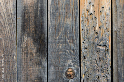 Old wooden wall cracked background. texture of old wood, old rustic fence