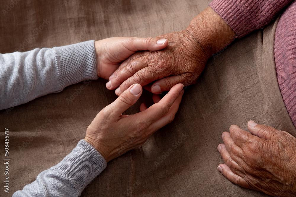 Old and young holding hands old age support help old people Old and young holding hands old age support help old people