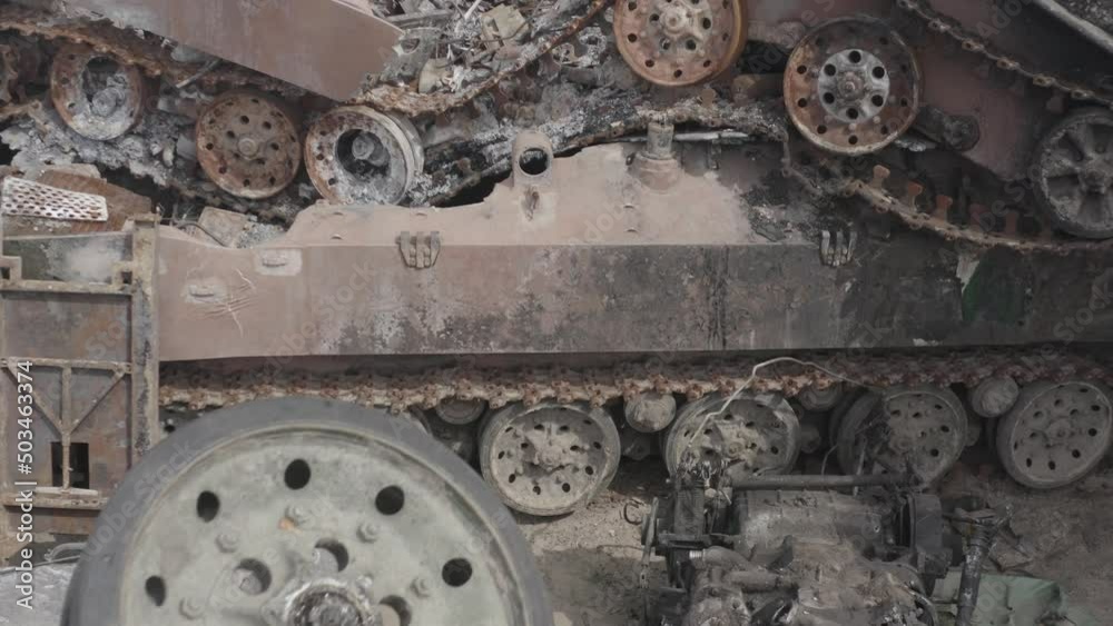 Destroyed military convoy. Burnt combat vehicles. Rusty tech. Consequences of an artillery strike. War in Ukraine. Bucha. Destroyed military convoy. Burnt combat vehicles. Rusty tech. Consequences of an artillery strike. War in Ukraine. Bucha.