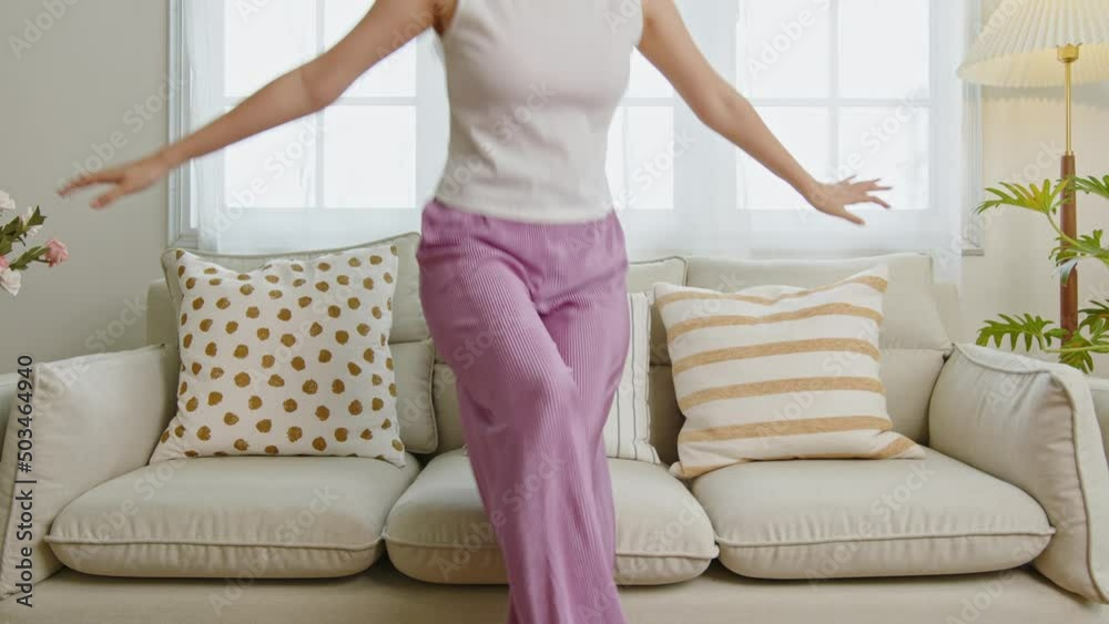 Home lifestyle asian woman relaxing on sofa in living room. Home lifestyle asian woman relaxing on sofa in living room.