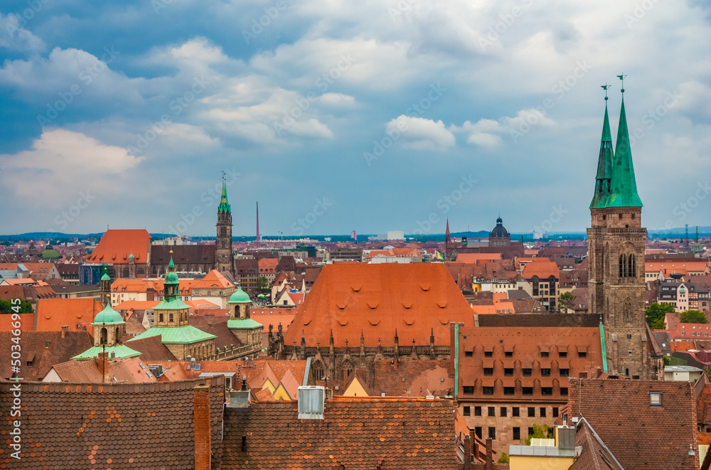 Gorgeous rooftop view over the historic city centre of Nürnberg, Germany. On the left stands the medieval church St. Lawrence (Lorenzkirche) and on the right the St. Sebaldus Church (Sebalduskirche).