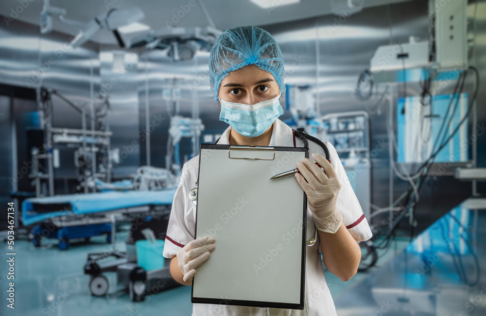 female doctor in white coat uniform showing empty clipboard to write for record patient diagnosis female doctor in white coat uniform showing empty clipboard to write for record patient diagnosis