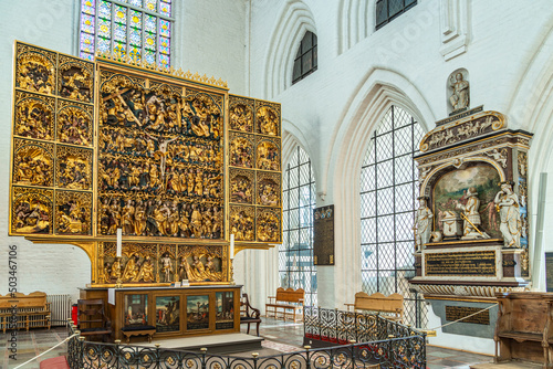 Canvas The altarpiece, representing the passion of Christ, in 23 carat gold leaf in the Cathedral of San Canuto in Odense