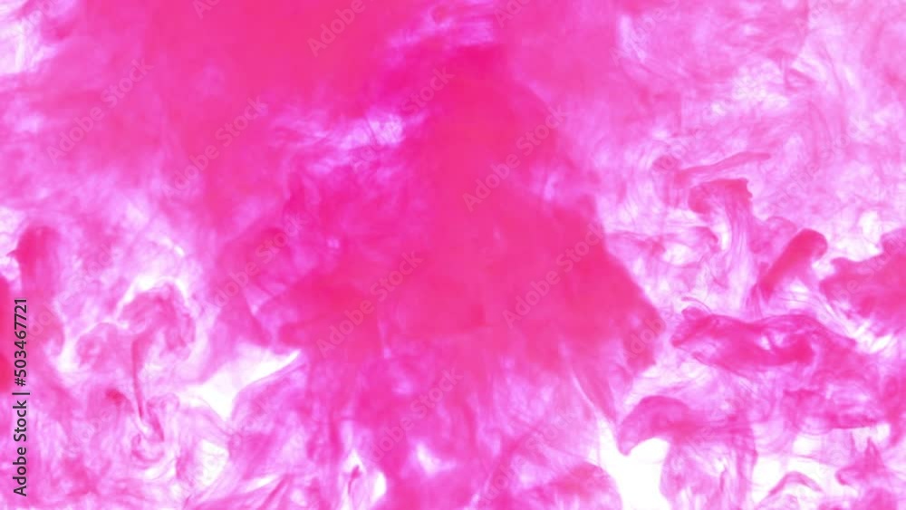 Red ink water explosion from above in slow motion. Acrylic ink in water on a white background. A powerful explosion of Red color. Red paint leak. Red ink water explosion from above in slow motion. Acrylic ink in water on a white background. A powerful explosion of Red color. Red paint leak.