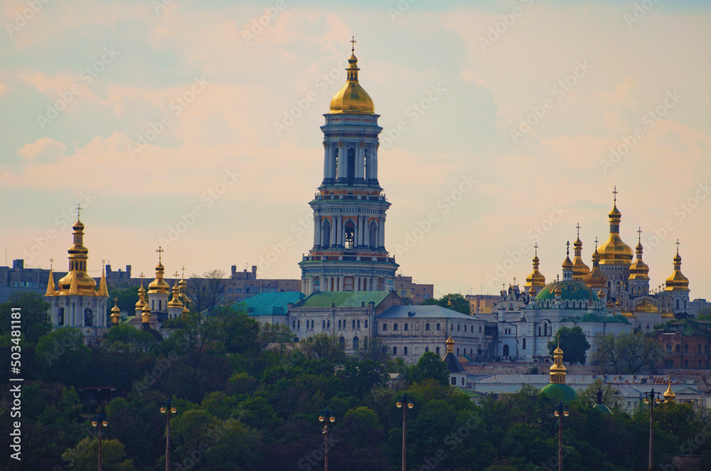 Scenic landscape of ancient Kyiv Pechersk Lavra. It is a historic Orthodox Christian monastery. Spring landscape view of Kyiv against blue sky. Kyiv, Ukraine