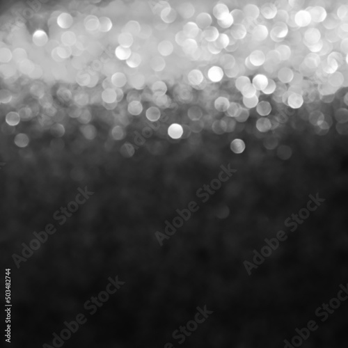 Trendy dark grey blurred and sparkling background