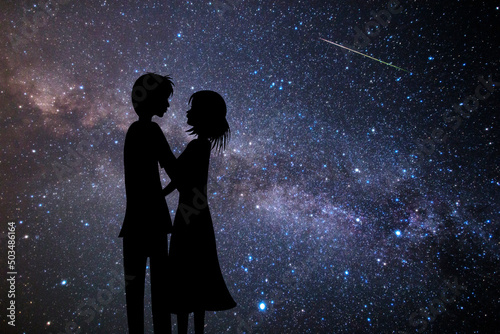 天の川と満天の星空をバックに見つめ合うカップルのシルエット。夏の恋のコンセプト。
 photo