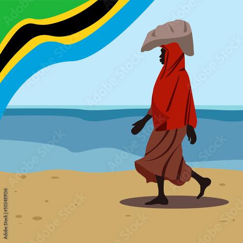 Tanzanian woman in national costume walks on the background of the flag of the country of tanzania photo
