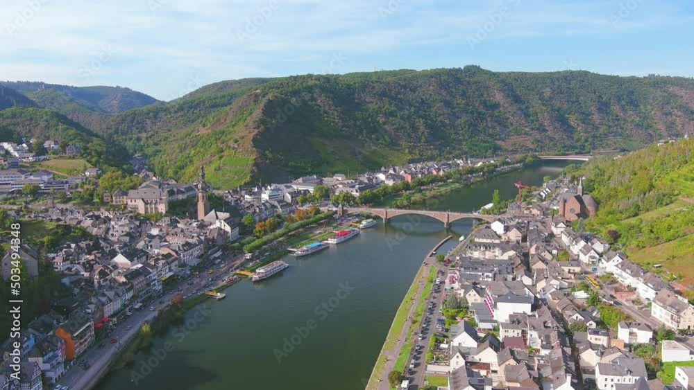 Cochem, Germany: Aerial view of picturesque town in lush valley of river Moselle - landscape panorama of Europe from above Cochem, Germany: Aerial view of picturesque town in lush valley of river Moselle - landscape panorama of Europe from above
