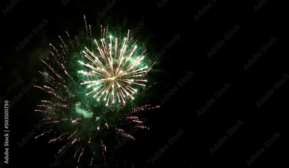 Firework close up photo. Beautiful fireworks in the night sky. Firework close up photo. Beautiful fireworks in the night sky.