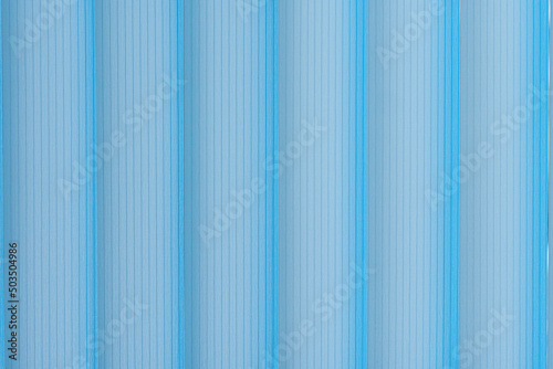 blue fabric blinds on the window