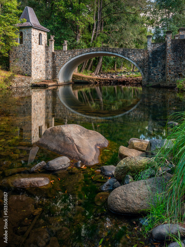 Stone bridge at the cedar Creek, Samford, Brisbane, Queensland, Australia photo