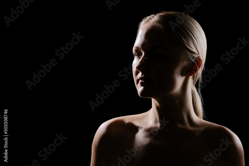 topless woman on black