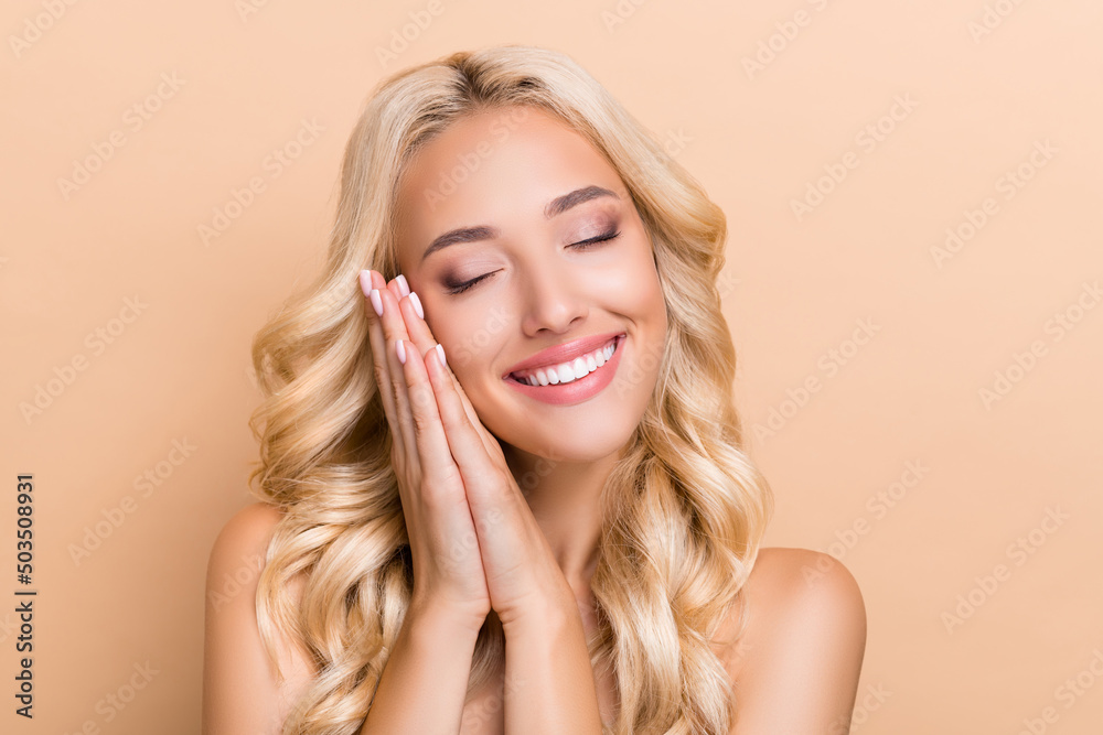 Portrait of attractive dreamy cute cheery wavy-haired girl sleeping enjoying isolated over beige pastel color background Portrait of attractive dreamy cute cheery wavy-haired girl sleeping enjoying isolated over beige pastel color background