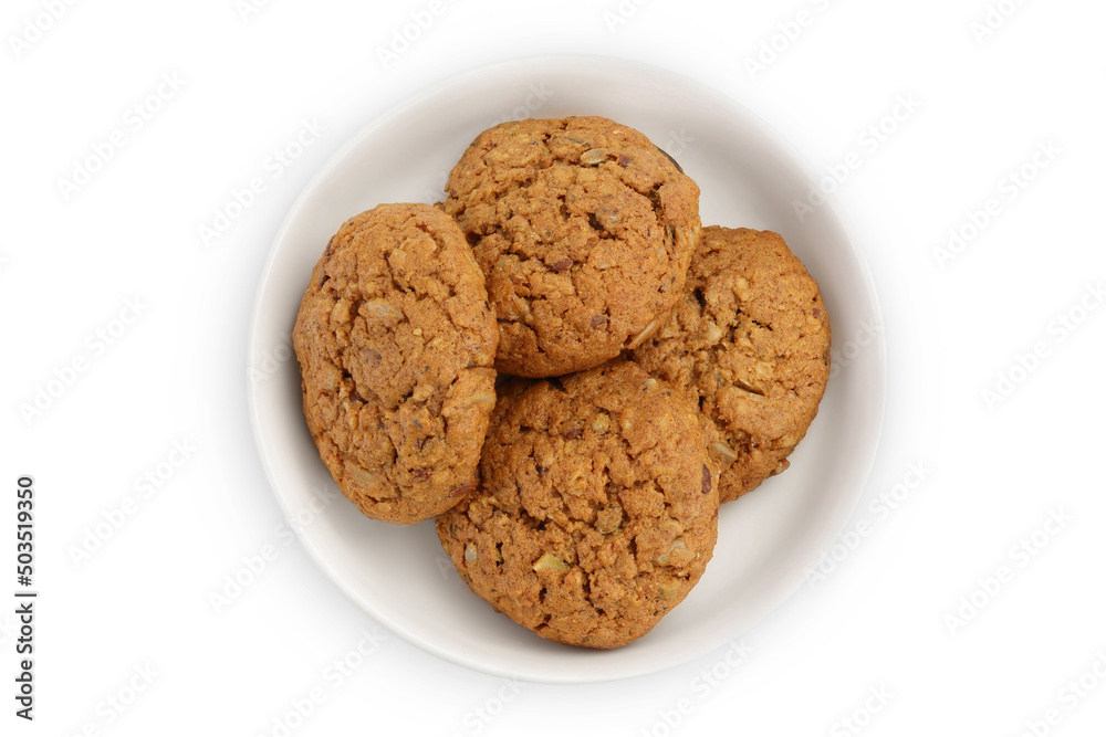 oatmeal cookies in ceramic bowl isolated on white background with clipping path and full depth of field. Top view. Flat lay oatmeal cookies in ceramic bowl isolated on white background with clipping path and full depth of field. Top view. Flat lay