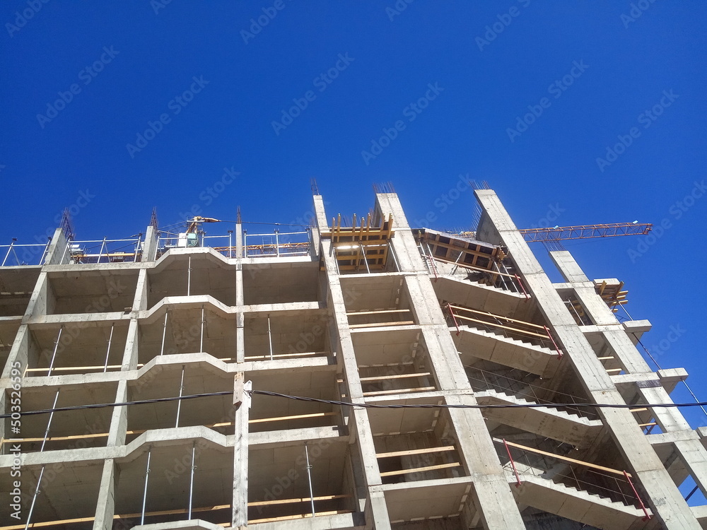 construction of a modern high-rise building
construction of a modern high-rise building