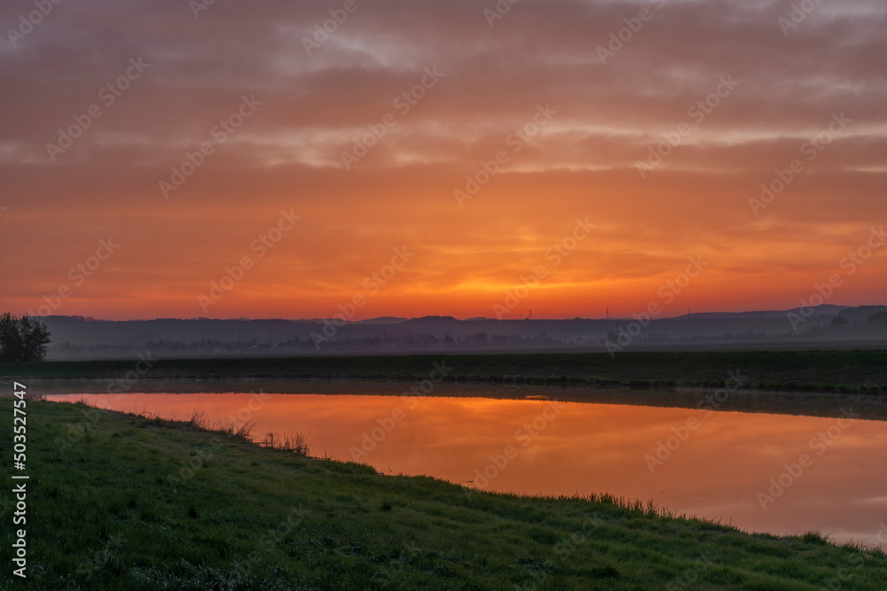 Morava river with sunrise near Kvasice village in central Moravia Morava river with sunrise near Kvasice village in central Moravia