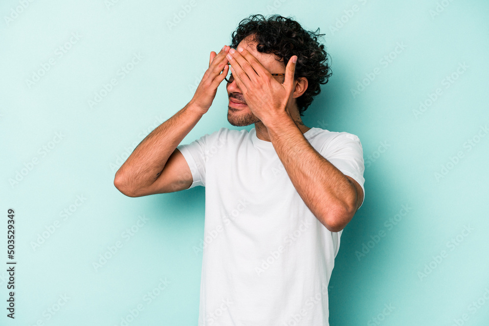 Young caucasian man isolated on white background afraid covering eyes with hands. Young caucasian man isolated on white background afraid covering eyes with hands.